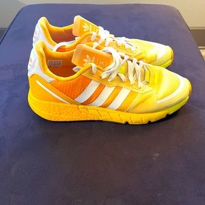 Adidas yellow and gold cross trainer